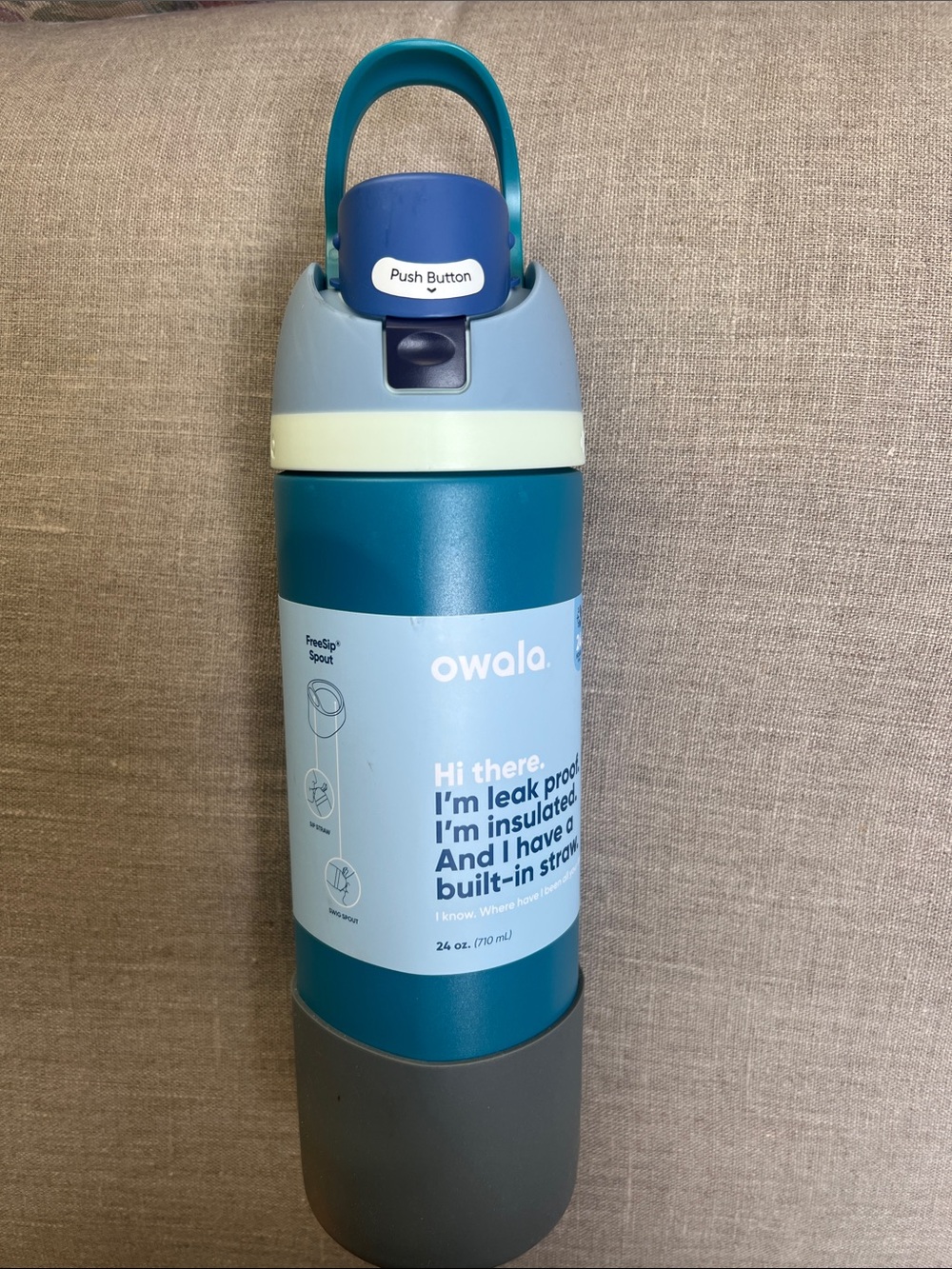Owala FreeSip Stainless Steel Water Bottle in a 24 oz size blue & teal color